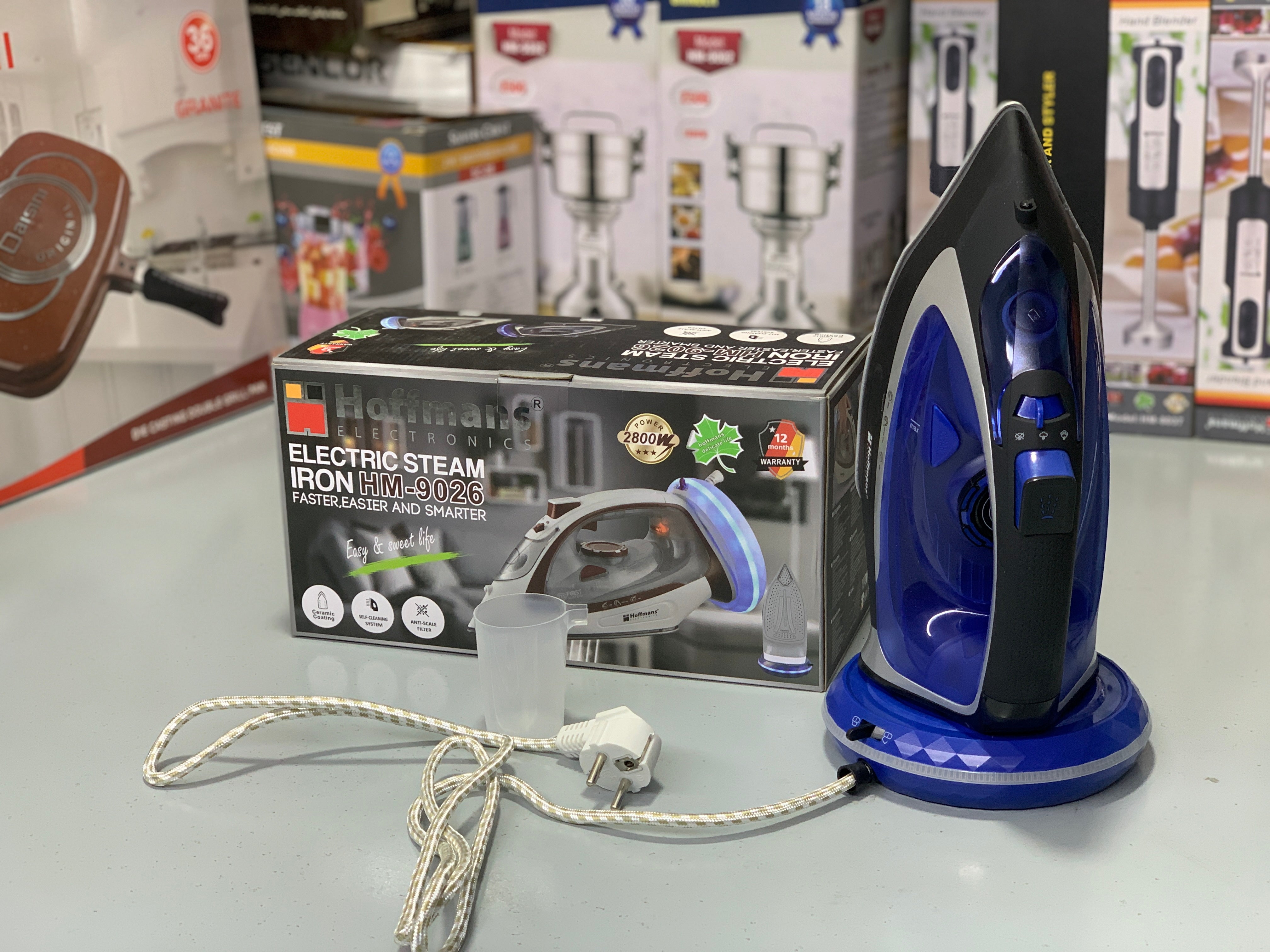 Hoffmans Powerful Steam Iron with LED Light Charging Base