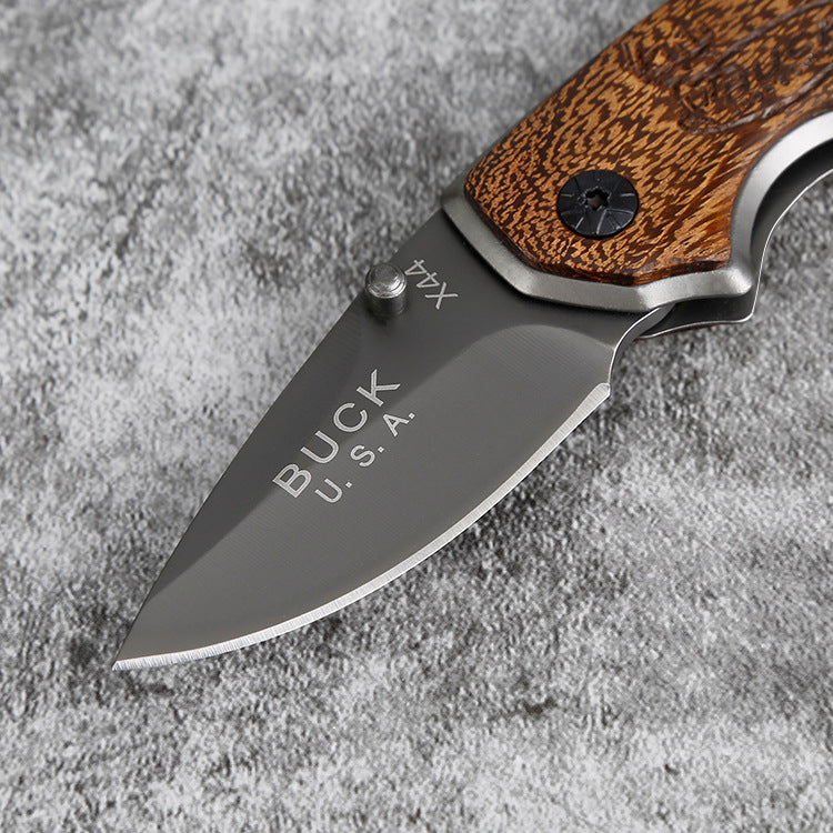 X44 Buck Folding Black Blade Knife